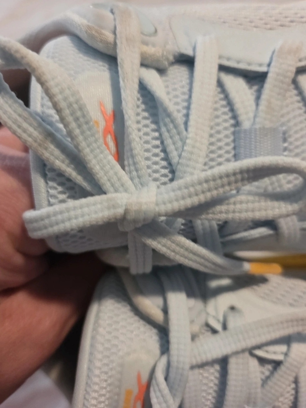 Skechers Light Blue Sneakers with Orange Accents